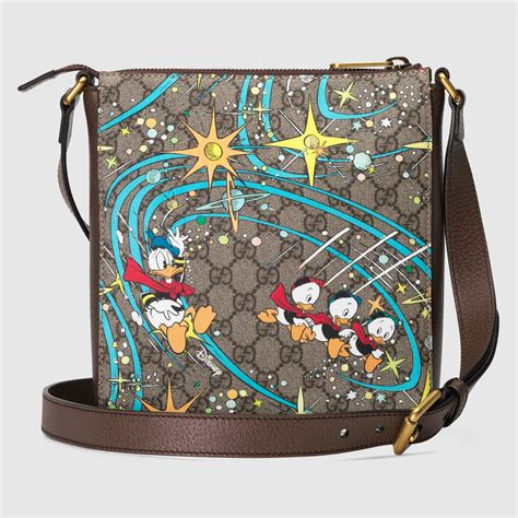 bolso gucci pato donald